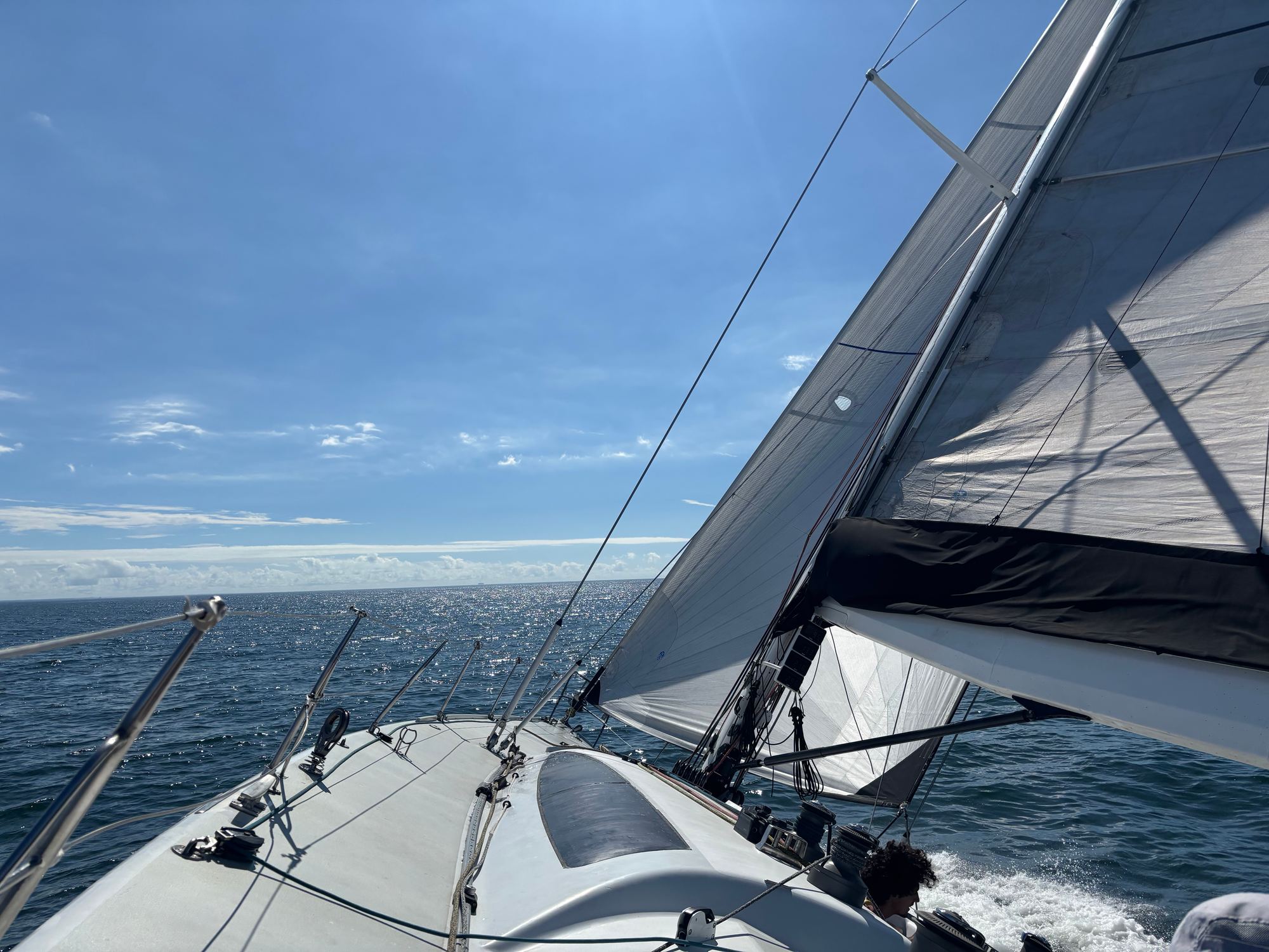 Crew on Warrior's deck under full sail