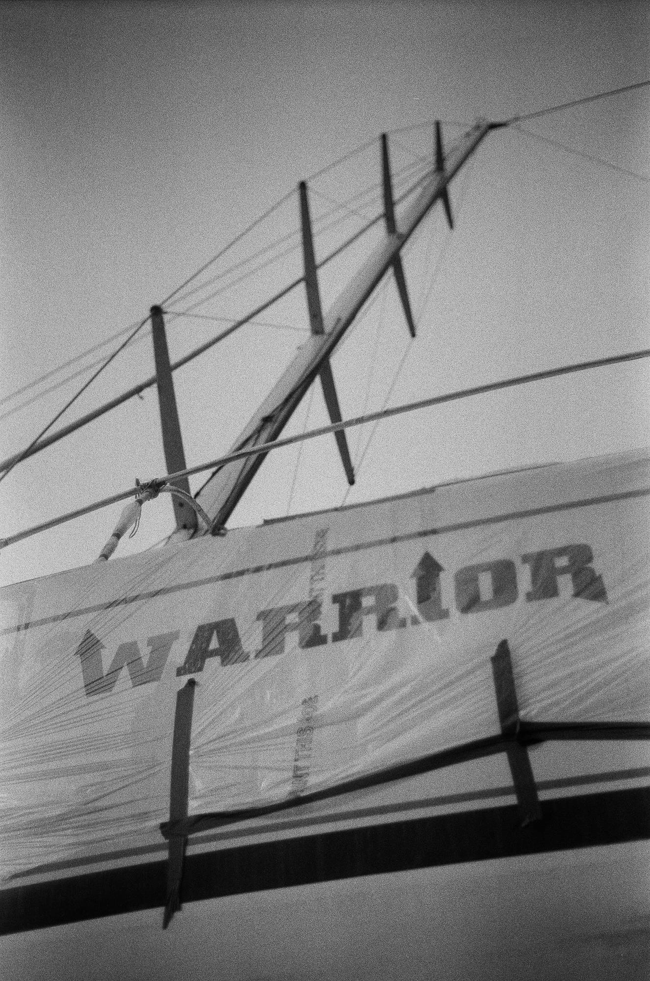 Warrior's name on the hull in black and white